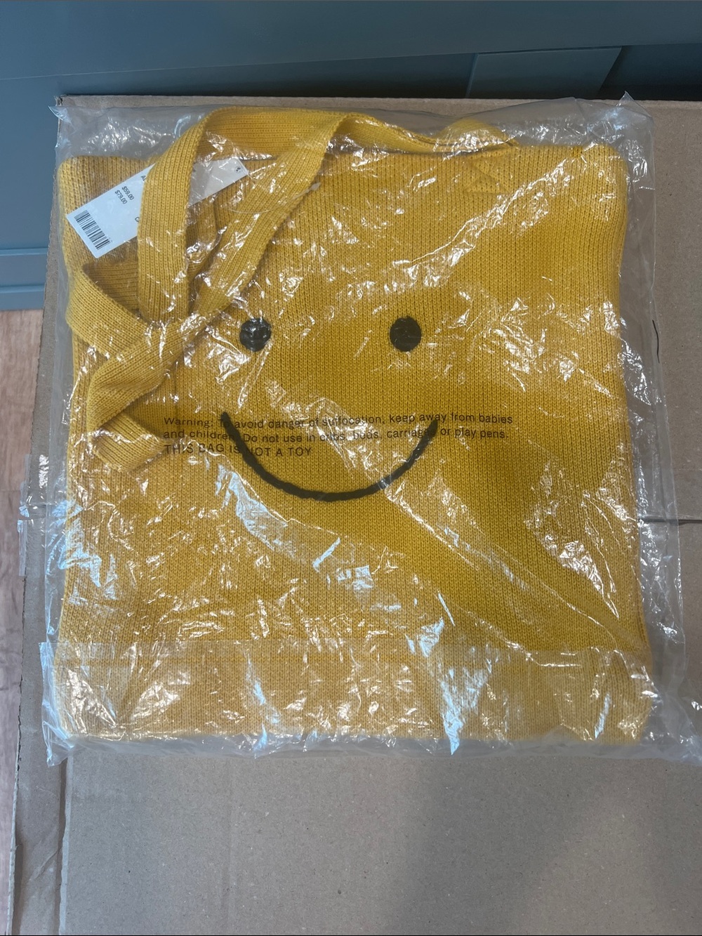 Urban Outfitters Mustard Yellow Smiley Knit Tote